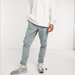 Tapered cargo pants with toggles in grey